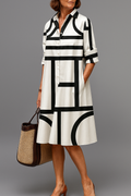 Ellie | Robe midi soignée et élégante
